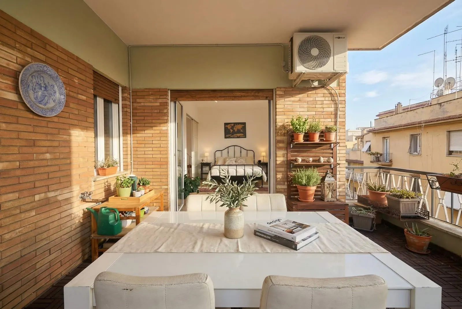 The terrace seen from the far end, with the suite's French window