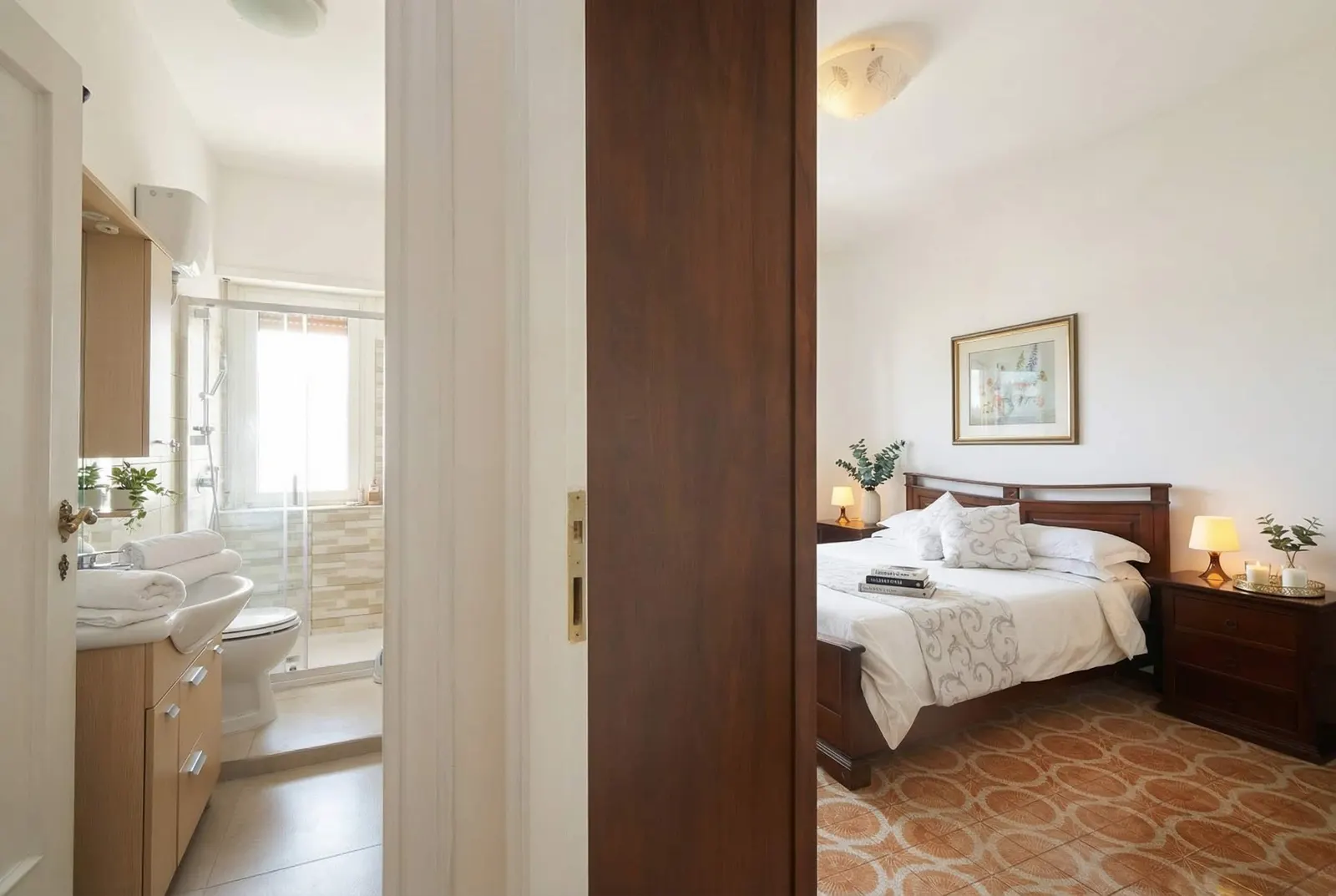 The romantic bedroom seen from its private bathroom